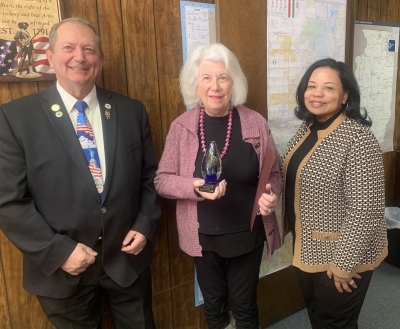 Mary Killough, acting head of the Illinois Department on Aging, and Rep. Tom Weber honor author Charlene Wexler.