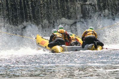 Students practice rescue from low-head dam